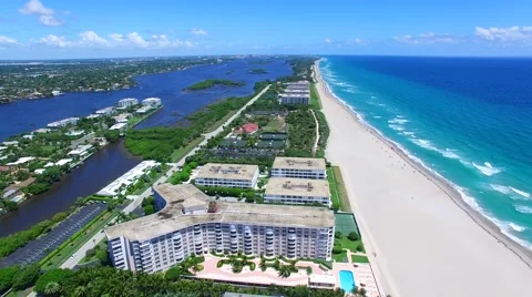 Aerial - Beautiful view of Golf Course next to apartment building and ocean . Stock Footage 66240836