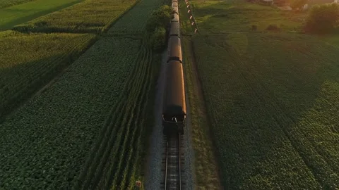 Aerial From Behind the Train View of A Steam Passenger Train Passing Thru Stock Footage 174491927