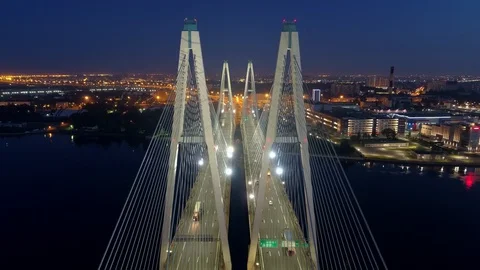 Aerial between pylons cable bridge St.Petersburg Russia lights night cityscape  Stock Footage 128749175