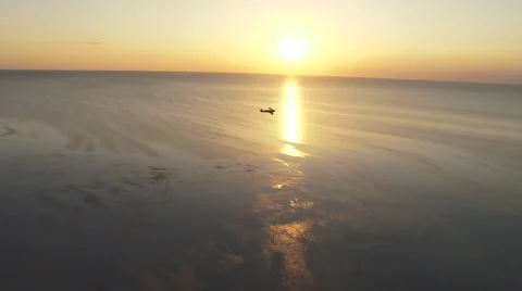 Aerial Bi-plane Sunset Distant Zoom Video stock 5878476