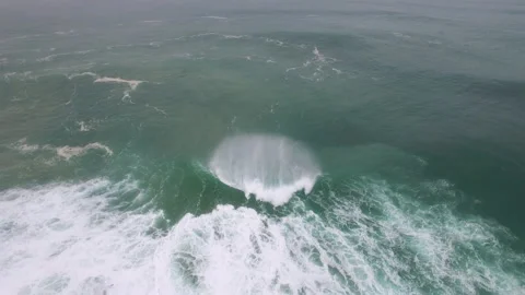 Aerial of big ocean waves arising from atlantic ocean and splashing forcefully Stock Footage 157704259