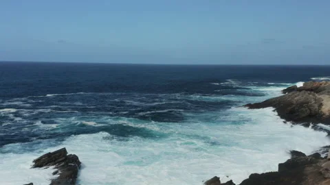 Aerial of big waves crashing into rocks in Jaizkibel, in Basque Country, Spain Video stock 154705053