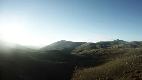 Aerial bird-eye view flying over mountain landscape showing mountains 4k Stock Footage 78084053