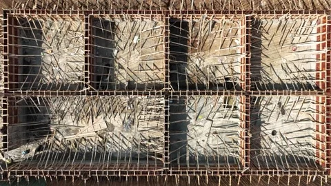 Aerial bird eye view ofthe early stages of construction. grid-like foundati.. Stock Footage 305752770