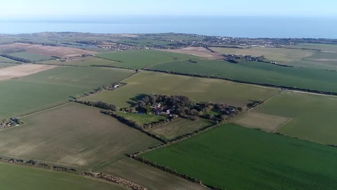 Aerial bird view flight over farm located at typical English countryside 4k Stock Footage 87766213