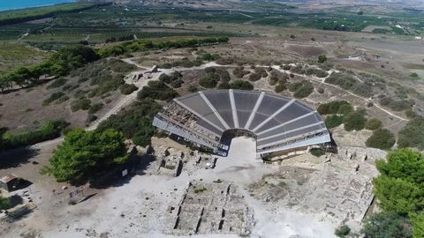 Aerial bird view flight towards theater ancient greek ruins of Heraclea Minoa 4k Stock Footage 84589047