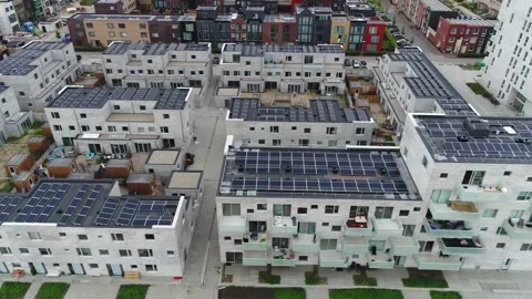 Aerial bird view flying left to right over unfinished new housing project 4k Stock Footage 150313603