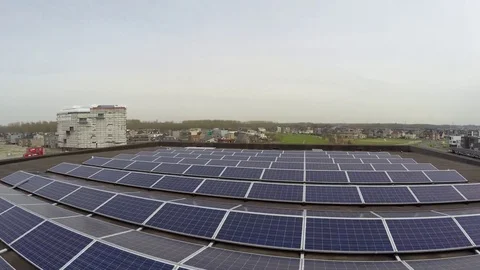 Aerial bird view flying low over roof filled with solar panels 4k Stock Footage 73553608
