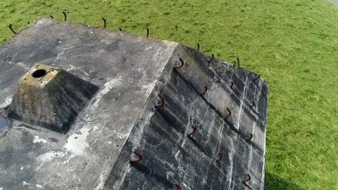 Aerial bird view moving backwards over World War 2 bunker 4k Stock Footage 85572230