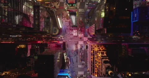 Aerial birds eye overhead top down ascending view of cars driving on streets Stock Footage 167736226