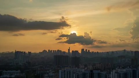 Aerial birds eye view of dramatic sunset time lapse in Petaling Jaya, Kuala Stock Footage 338992623