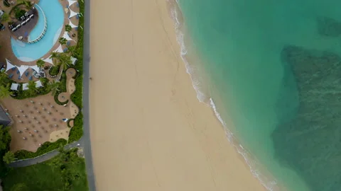 Aerial Birds-eye-view of empty Waikiki Beach during pandemic Stock Footage 136631984