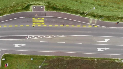 Aerial birds eye view of a quiet road and intersection Stock Footage 121153653
