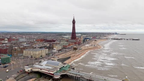 Aerial Blackpool UK of tower, beach and North Pier promenade Stock Footage 340847131