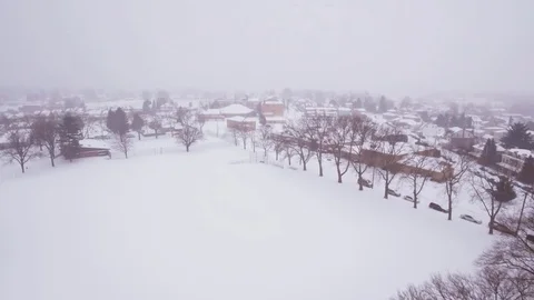 Aerial blizzard in town Stock Footage 74154023