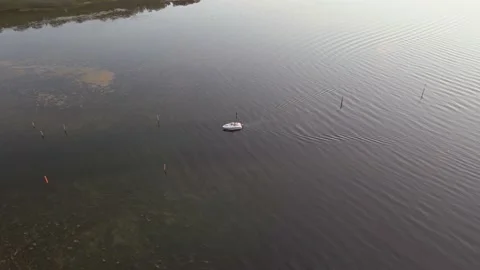 Aerial of boat at sunset Stock Footage 164919662