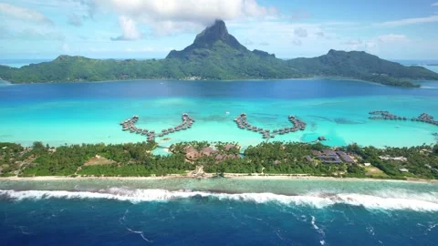 Aerial Bora Bora drone view of overwater bungalow villas in lagoon, Tahiti 4k Stock Footage 252235466