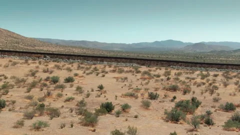 Aerial: Border Wall between USA and Mexico, California, USA Video stock 159773403