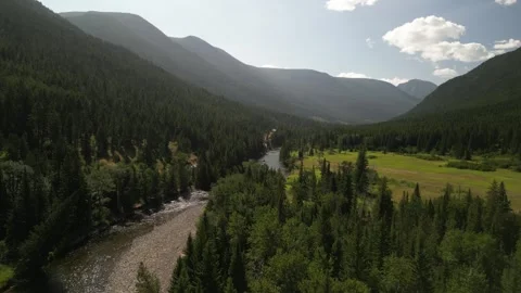 Aerial of Boulder River in Absaroka Mountain Range in Montana in summer Stock Footage 282922639