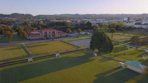 Aerial: Bowling green and bath house in government gardens, Rotorua, New Zealand 動画素材 218516255
