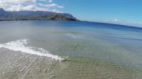 Aerial Breaking Clear Waves in Shallow Water in Kauai Hawaii 1080 Ultra HD Video Видео 36279980