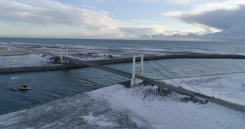 Aerial of bridge across river stream Stock Footage 116258086