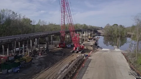 Aerial of bridge construction with large boom crane 4K Video stock 110924062