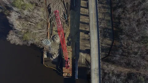 Aerial of bridge construction with large boom crane 4K Video stock 110924286