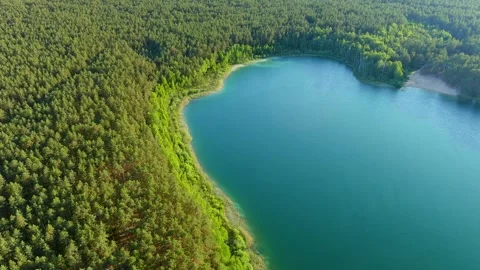 Aerial bright summer evening view of beautiful green waters of lake Gela Vídeos de archivo 247267998