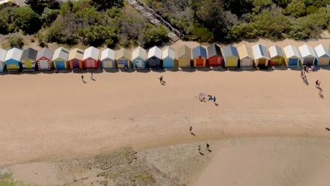 Aerial of Brighton Bathing Boxes in Melbourne facing front, dolly movement Stock Footage 97149590