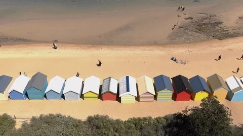 Aerial of Brighton Bathing Boxes in Melbourne facing the sea, rising crane shot Stock-Footage 97150351