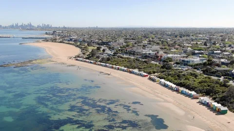 Aerial of Brighton Bathing Boxes with Melbourne city in the background, approach Stock-Footage 97152082
