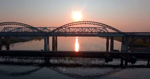 Aerial. Building of a bridge at sunset Stock Footage 73431746
