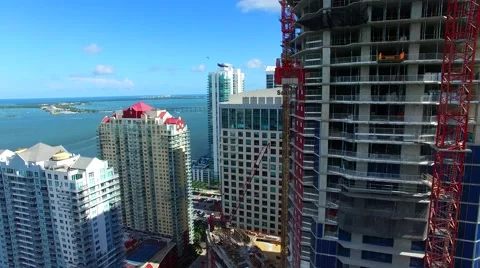 AERIAL - Building in construction with an ocean view Stock Footage 65154070