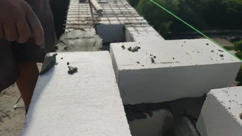 Aerial Building Process of Construction Site. Engineers crane and city. Stock Footage 123655992