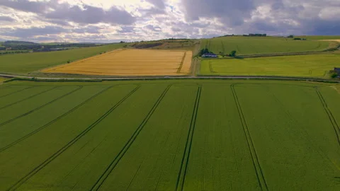 AERIAL: Busy asphalt road passing green ... | Stock Video | Pond5