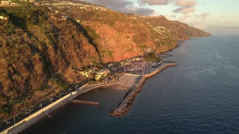 Aerial of Calheta with artificial beach at sunset, Madeira Stock Footage 310831867