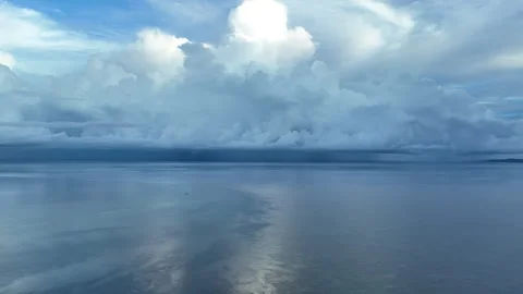 Aerial of Calm Seas and Dramatic Cloudscape in the Indo-Pacific Stock Footage 312585217
