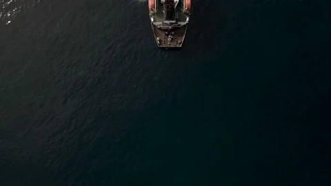 Aerial (camera down) back to front view, Fishing Ship, Morning, Calm, Sun Rise Stock-Footage 163095305
