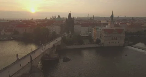 Aerial camera flies backwards along the Charles Bridge Video stock 66564678