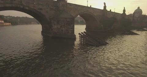 Aerial camera flies backwards from the Charles Bridge Stock Footage 66567579