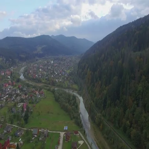 Aerial camera flies high over the village of Mykulychyn Stock Footage 69401330