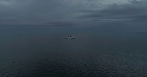 Aerial camera flies towards a small passenger ferry Odessa Stock Footage 76841580