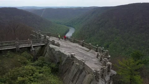 Aerial camera flying out over the Coopers Rock sandstone overlook showing the Stock Footage 130463476