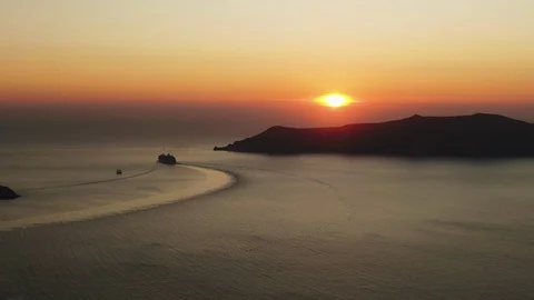 Aerial Camera Goes Down Rear Shot Of A Moving Cruise Ship In Beautiful Sunset Stock Footage 120290252