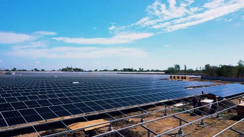Aerial Camera moving forward, engineers Installation solar panels, weather Video stock 236613370