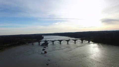 Aerial, camera moving towards abandoned railroad bridge Stock Footage 73146472