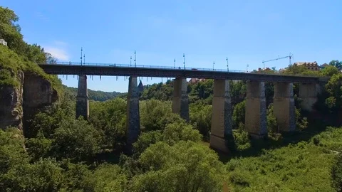 Aerial camera over the canyon and bridge Stock Footage 77266224