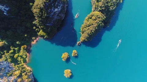 AERIAL. Camera rotates. Beautiful top view of viridian Green Lake and majestic Stock Footage 86204837