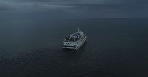 Aerial camera tracks a small passenger ferry Odessa Stock Footage 76841971